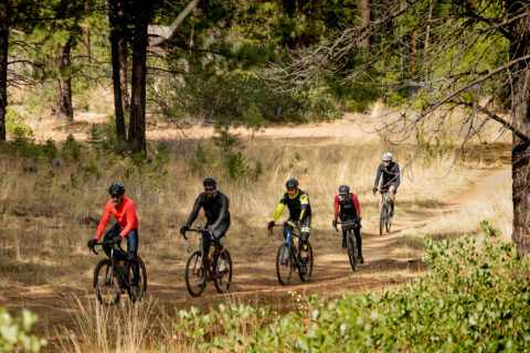 Gravel riders on a forest trail in Bend, Oregon. 